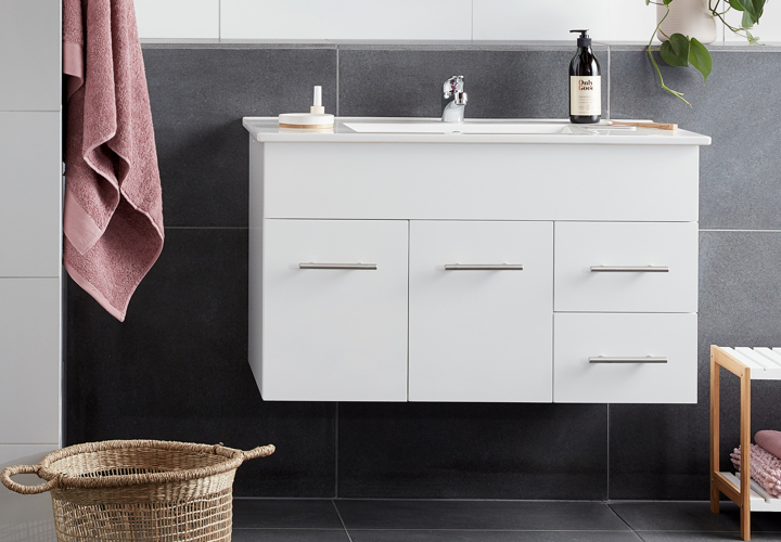 Image of a bathroom displaying Bristol fittings and products: a sink, cabinets, wall tiles and more.